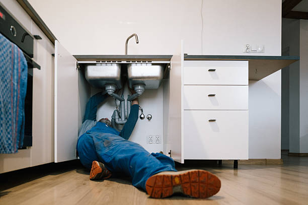 Professional Drain Cleaning technician working in Indio, CA